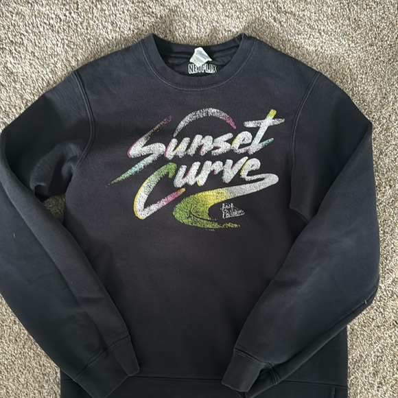 Small black sweatshirt from the ‘Netflix’ store from Julie & the Phantoms. - Picture 1 of 2